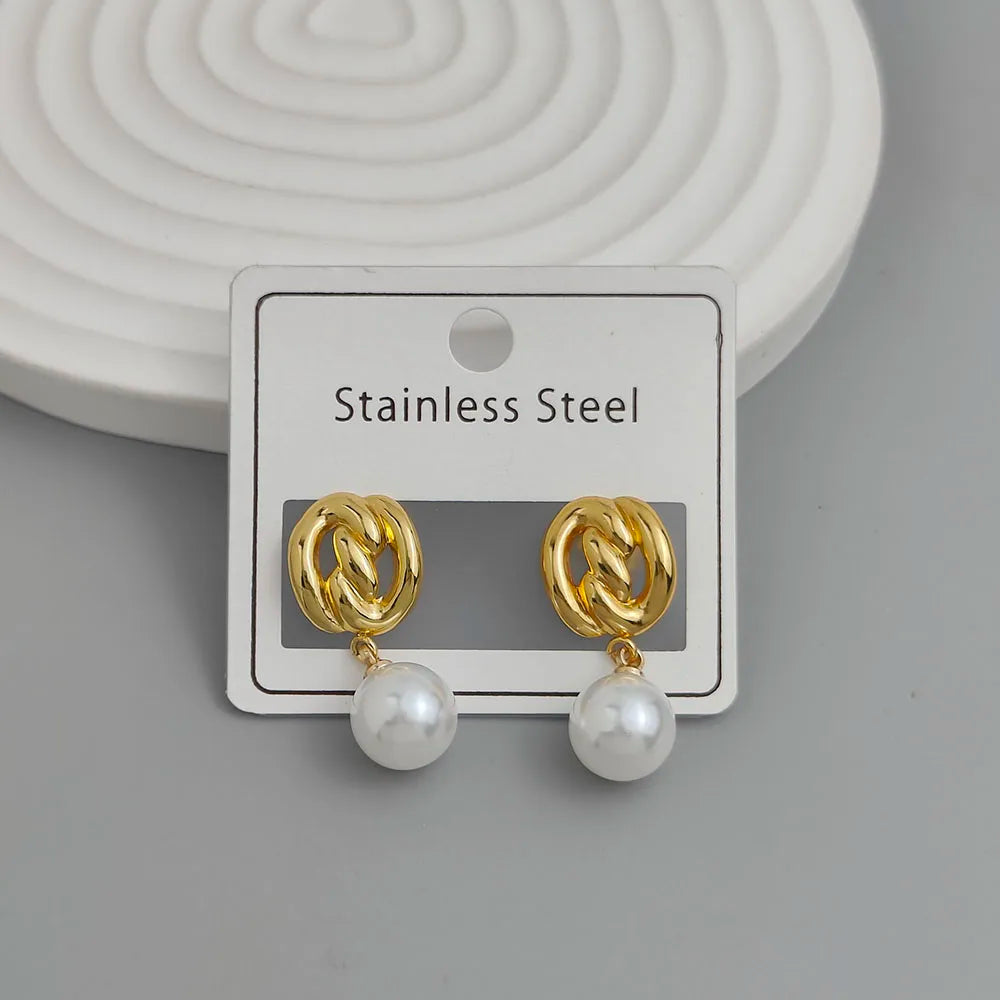 Creative heavy metal pearl shell stainless steel earrings, waterproof and rusty-free women's earrings, party jewelry Vera Lux