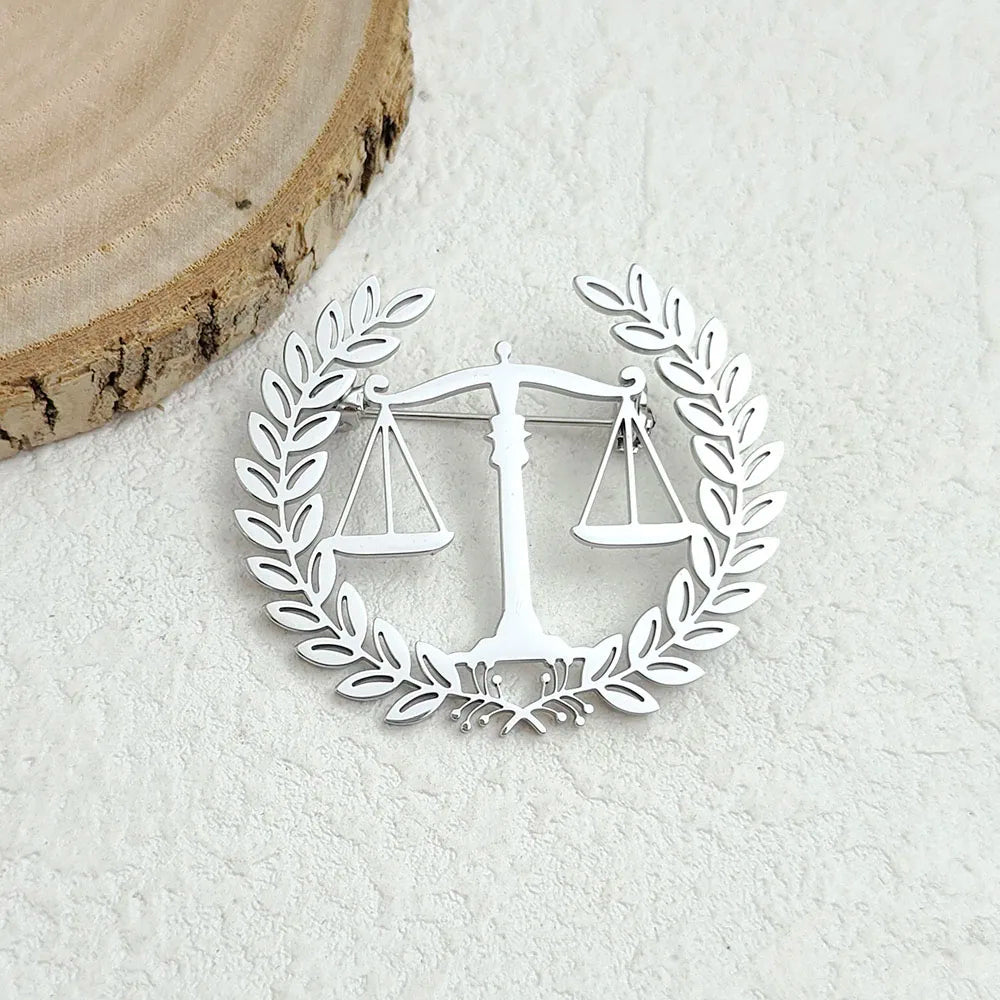 Original fair and justice balance hollow stainless steel gold-plated 18K brooch, suit lapel pin, waterproof formal fittings Vera Lux