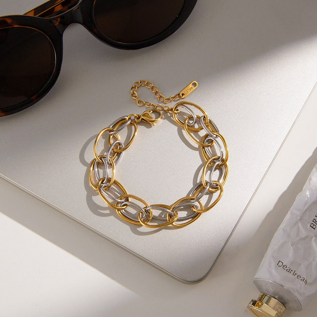 18K gold-plated, lightweight, and luxurious two-tone titanium steel bracelet. Vera Lux