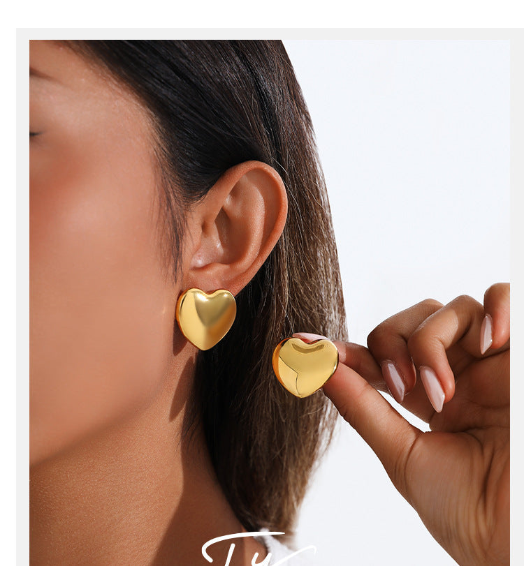 European And American Minimalist Glossy Heart-shaped Stainless Steel Earrings For Women. Light Luxury Minimalist Style. Exaggerated Heart-shaped Earrings. Versatile Accessories. Vera Lux