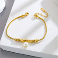 18k gold snake bone beaded anklet with a large heart-shaped heart Vera Lux