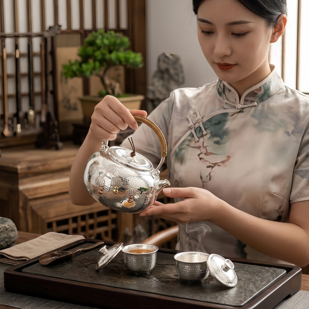 Pure 999 Fine Silver Handcrafted Hammered Silver Teapot with Gourd Vine Relief and Rattan Handle - Handicraft Vera Lux