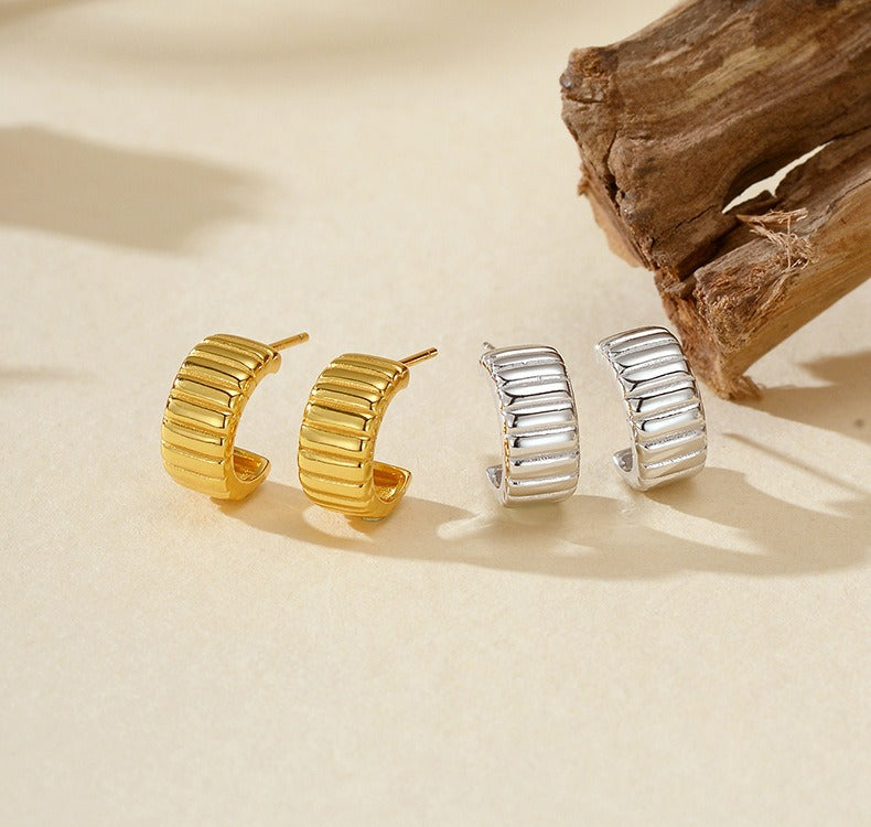 18K gold-plated, solid sterling silver C-shaped hoop earrings. Vera Lux