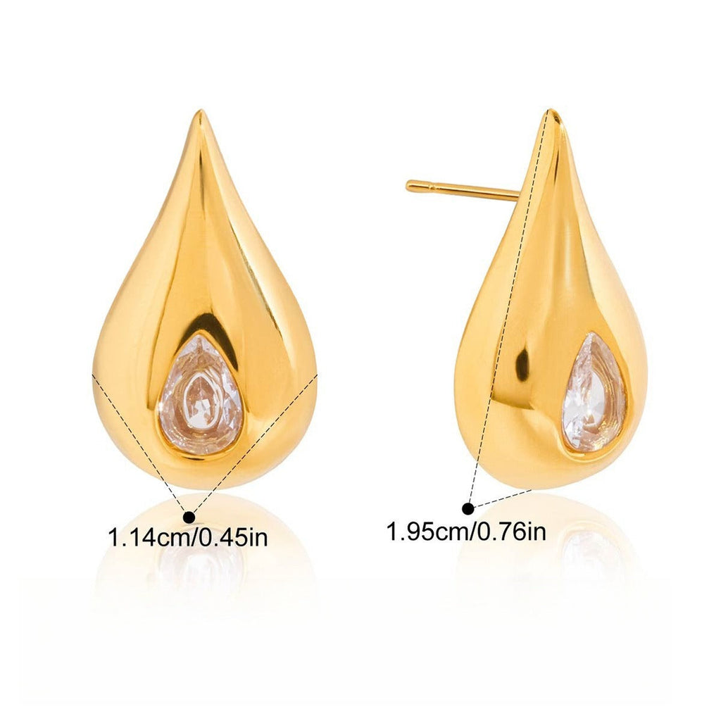 18K gold earrings inlaid with cubic zirconia in a teardrop design. Vera Lux