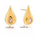 18K gold earrings inlaid with cubic zirconia in a teardrop design. Vera Lux