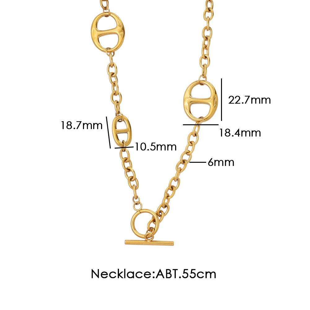 18K gold geometric-shaped necklace, bracelet, and earrings set. Vera Lux
