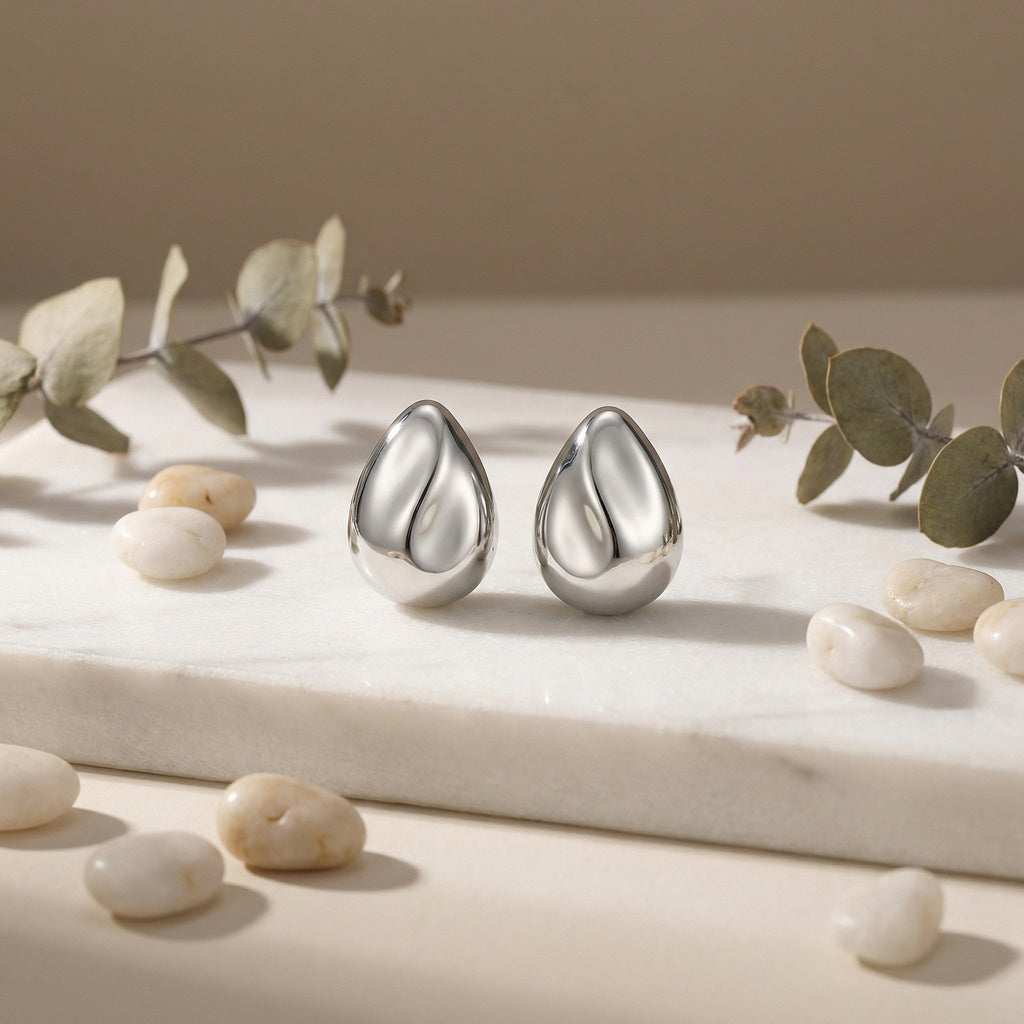 925 Sterling Silver Minimalist Polished Silver Teardrop Stud Earrings with Sculptural Wave Detail Vera Lux