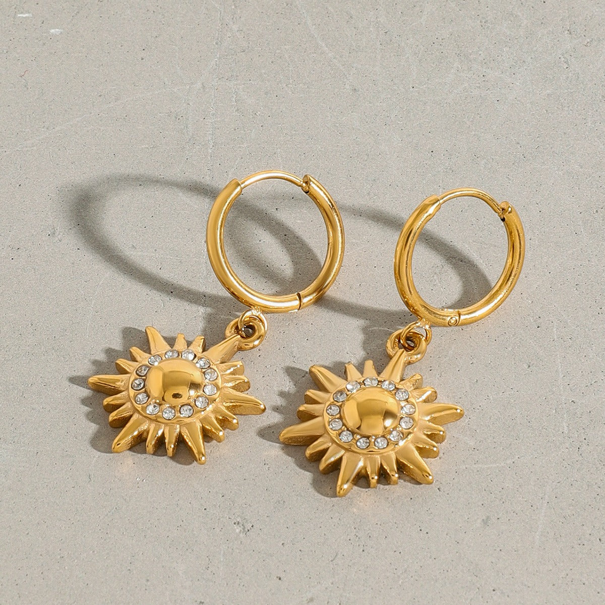 18k gold sun-shaped diamond-studded earrings with unique design Vera Lux