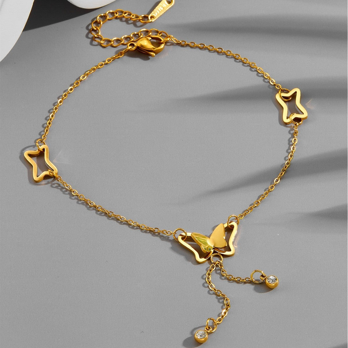 Rose gold trendy titanium steel butterfly tassel bare anklet Vera Lux