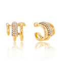 18K gold earrings inlaid with cubic zirconia, in a nail design. Vera Lux