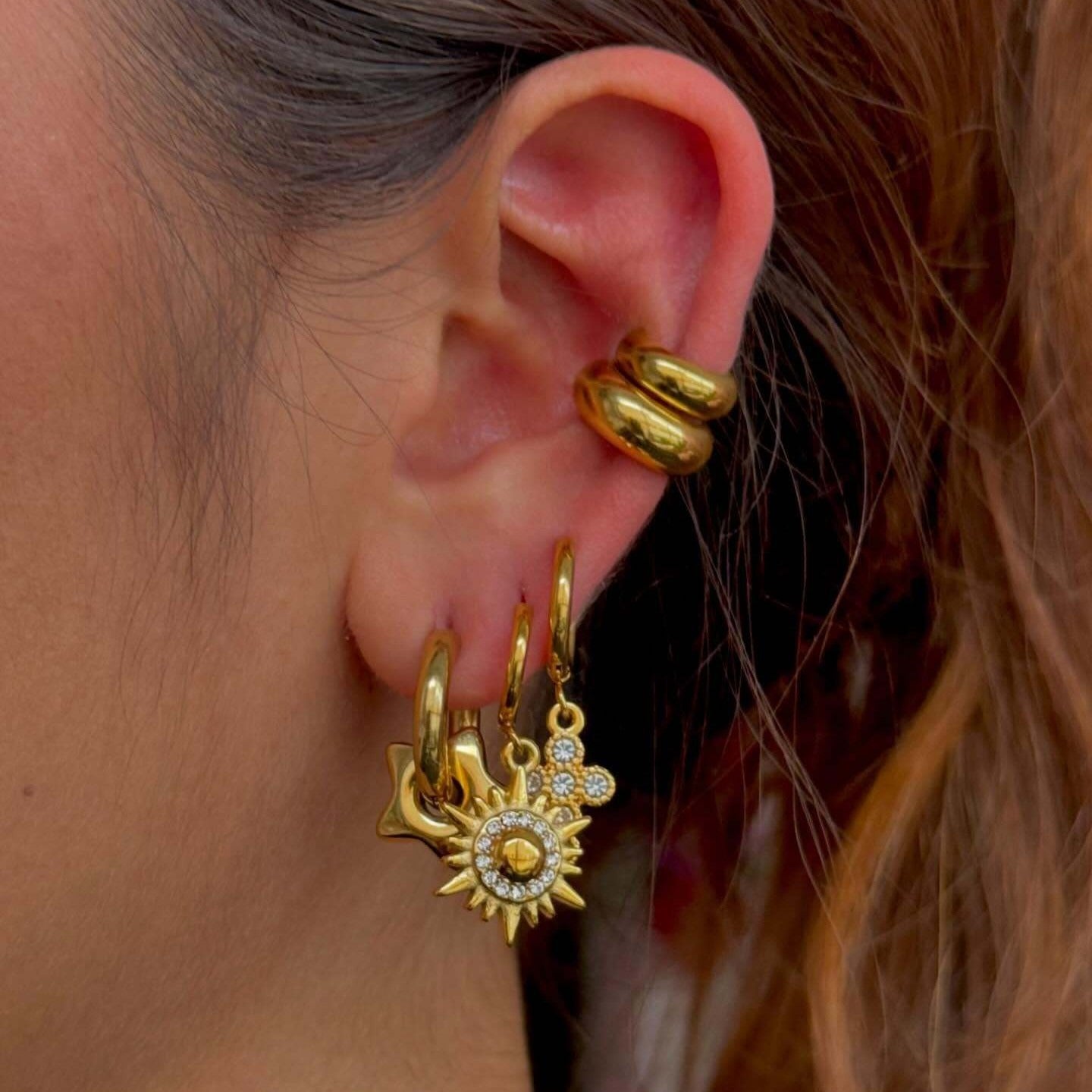 18k gold sun-shaped diamond-studded earrings with unique design Vera Lux