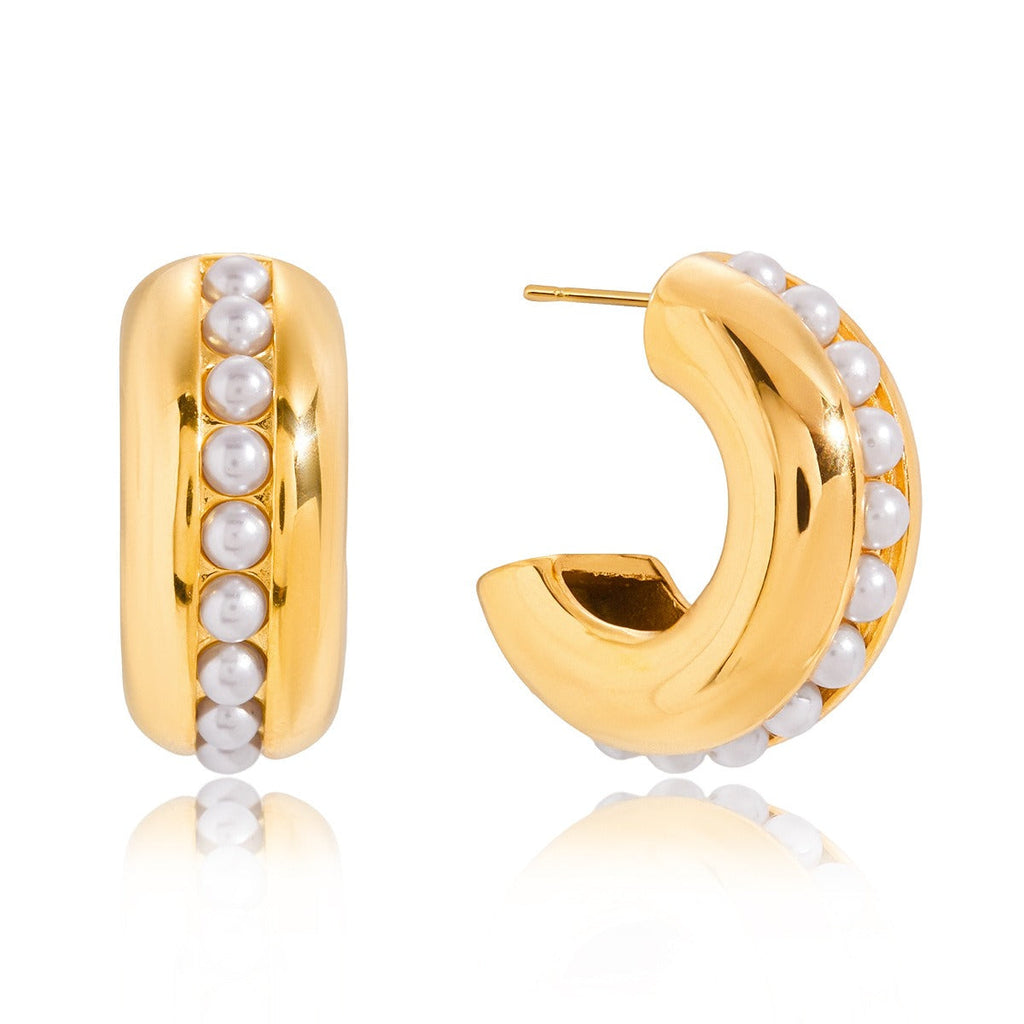 Luxurious and sophisticated 18K gold earrings with embedded pearls. Vera Lux