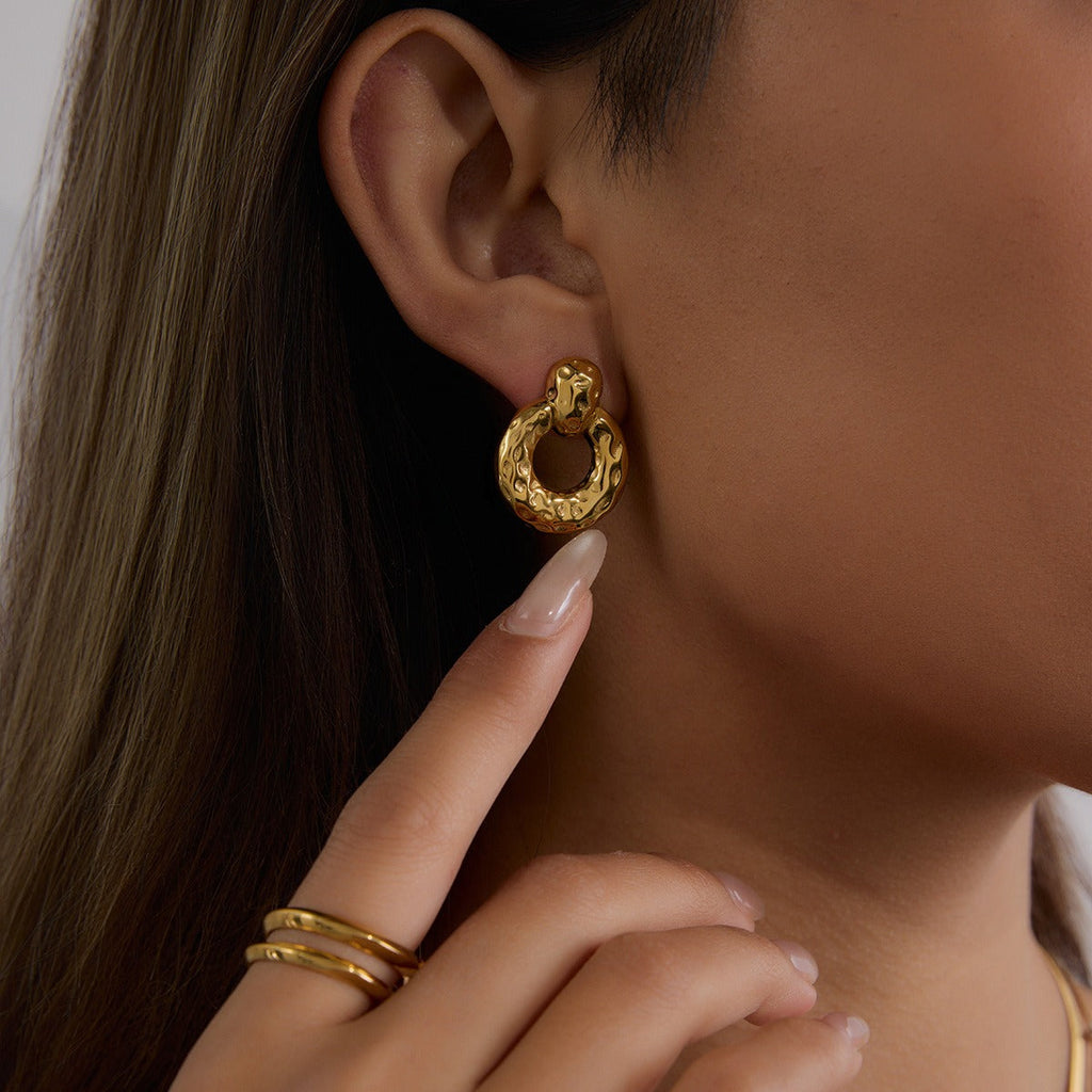 18K gold hollow round with texture design unique personality earrings18K gold hollow round with texture design unique personality earrings Vera Lux