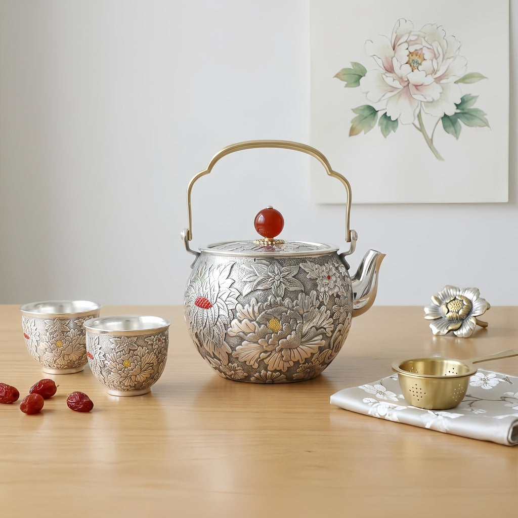 Pure 999 Fine Silver Ornate Handcrafted Silver Tea Kettle Featuring Detailed Floral Engravings and Red Gemstone Lid - Handicraft Vera Lux