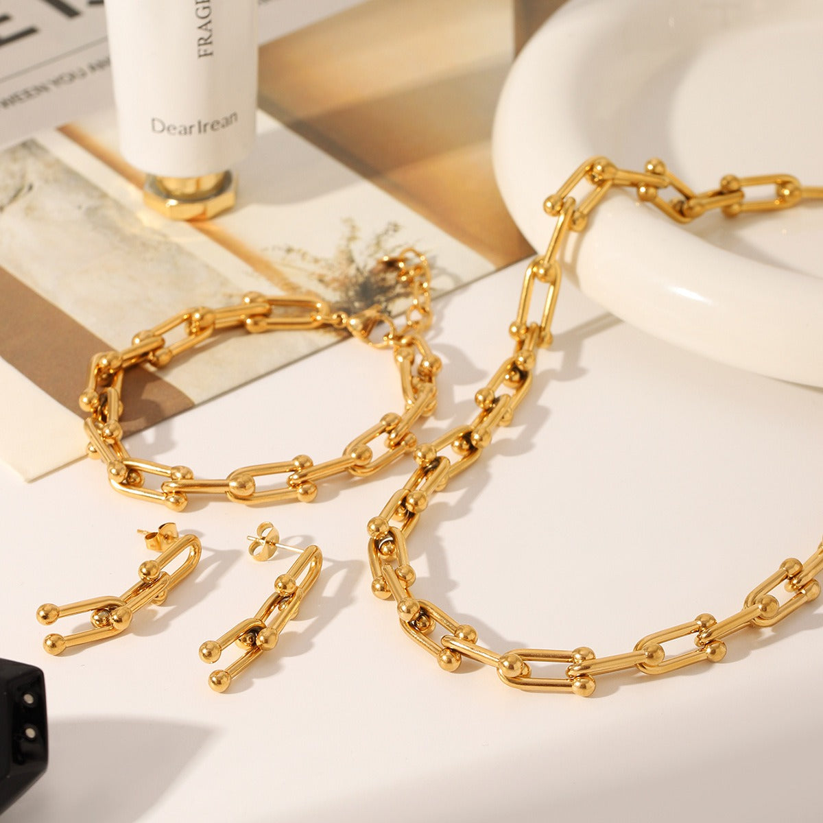 18k gold horseshoe chain bracelet and earrings Vera Lux