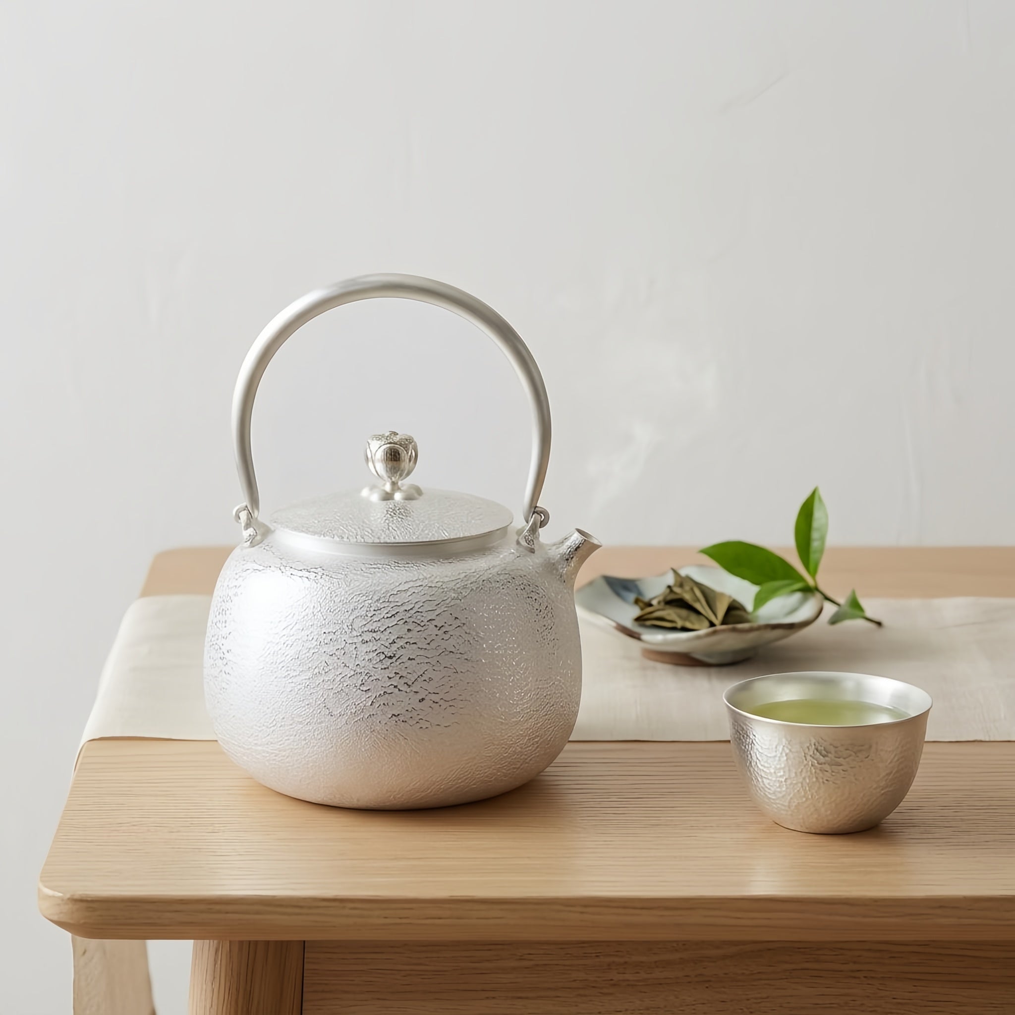 Pure 999 Fine Silver Handcrafted Fine Silver Teapot with Hammered Texture and Elegant Arched Handle - Handicraft Vera Lux