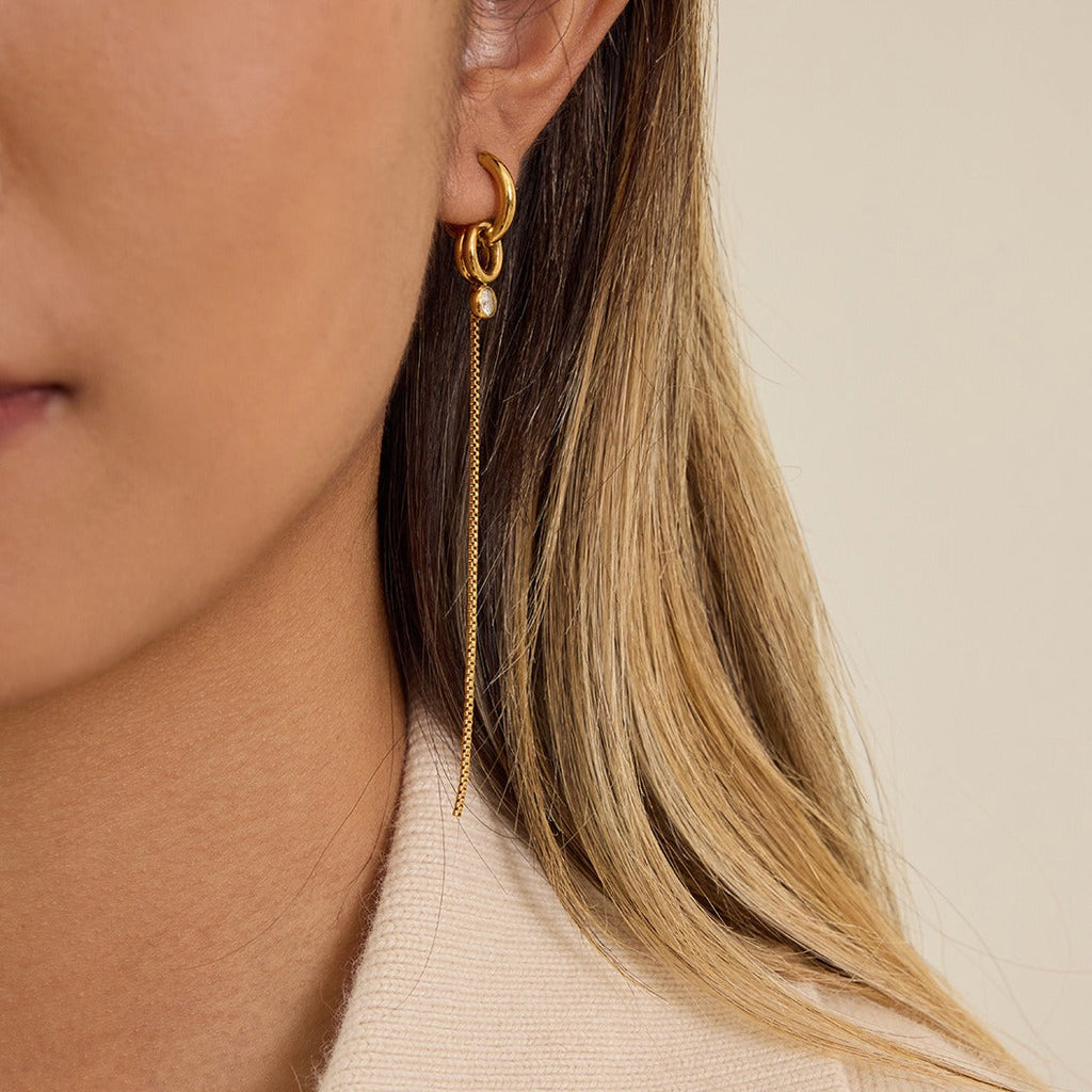 18K gold lightweight luxury tassel earrings with cubic zirconia. Vera Lux