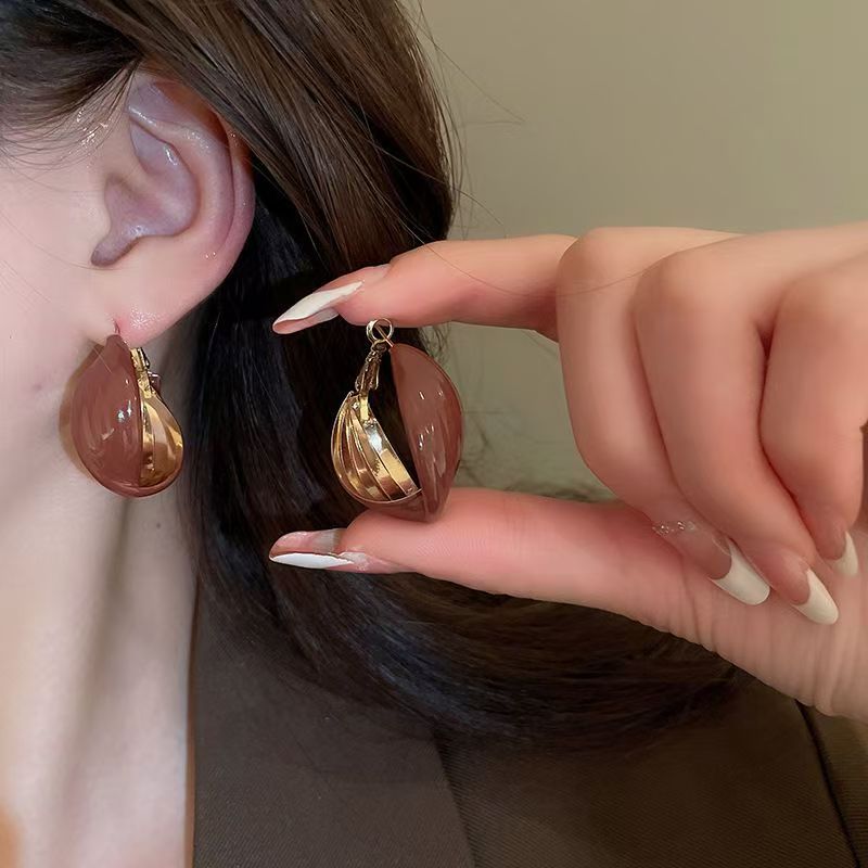 Silver Needle Twisted Hollow Hoop Earrings, European American Style, Unique Niche High-end Ear Jewelry For Women Vera Lux