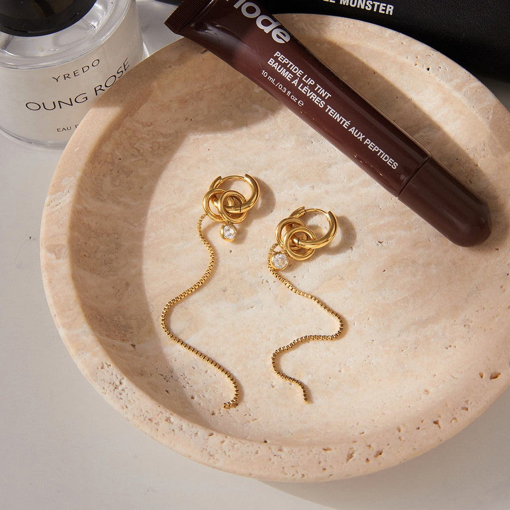 18K gold lightweight luxury tassel earrings with cubic zirconia. Vera Lux