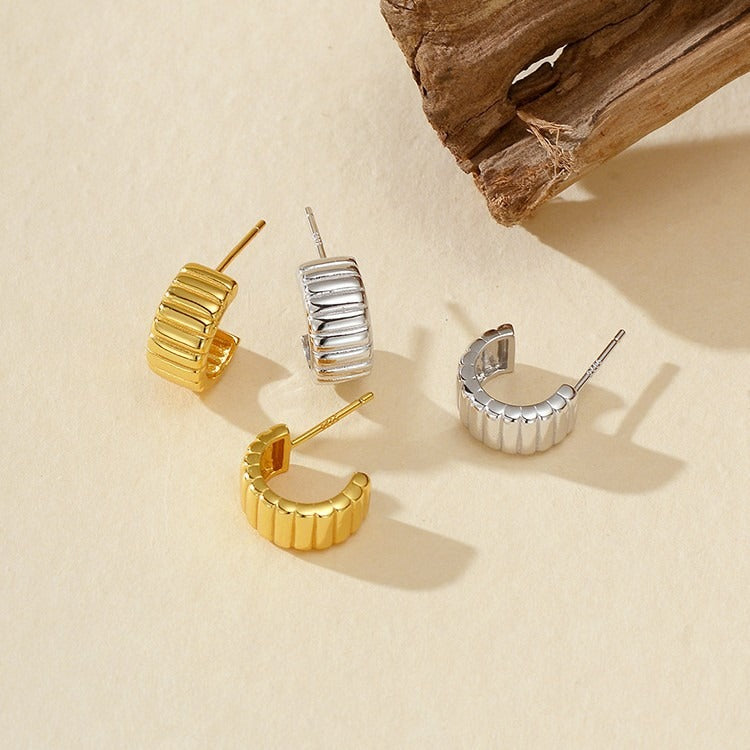 18K gold-plated, solid sterling silver C-shaped hoop earrings. Vera Lux